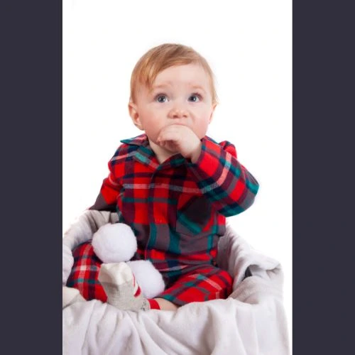 Baby Christmas photoshoot with snowball