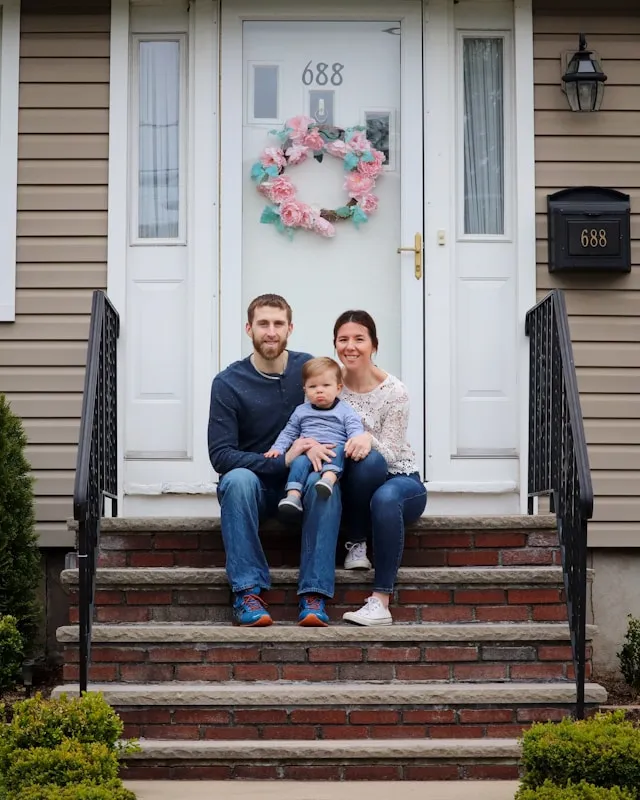 Family celebrating new home photography